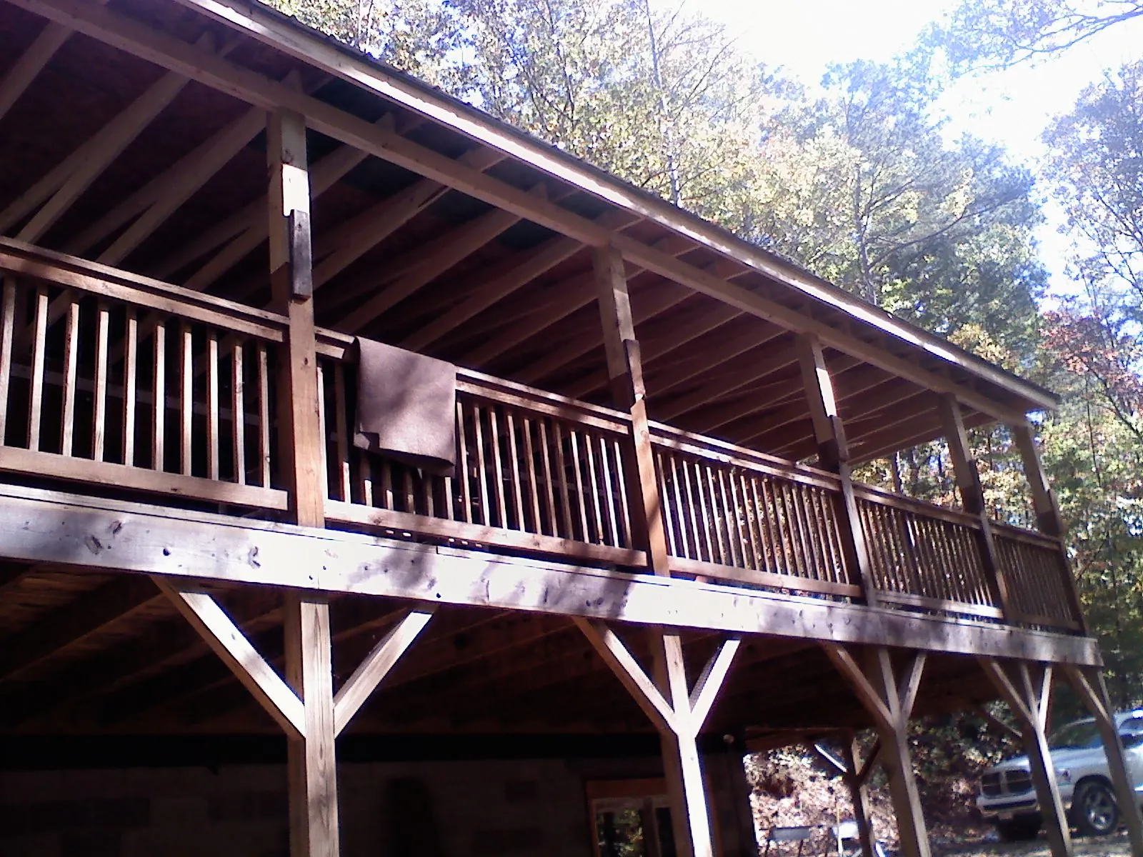 Timber framing under a new elevated porch and deck — Roof Leak Repair in South Hadley by Roofing Brothers